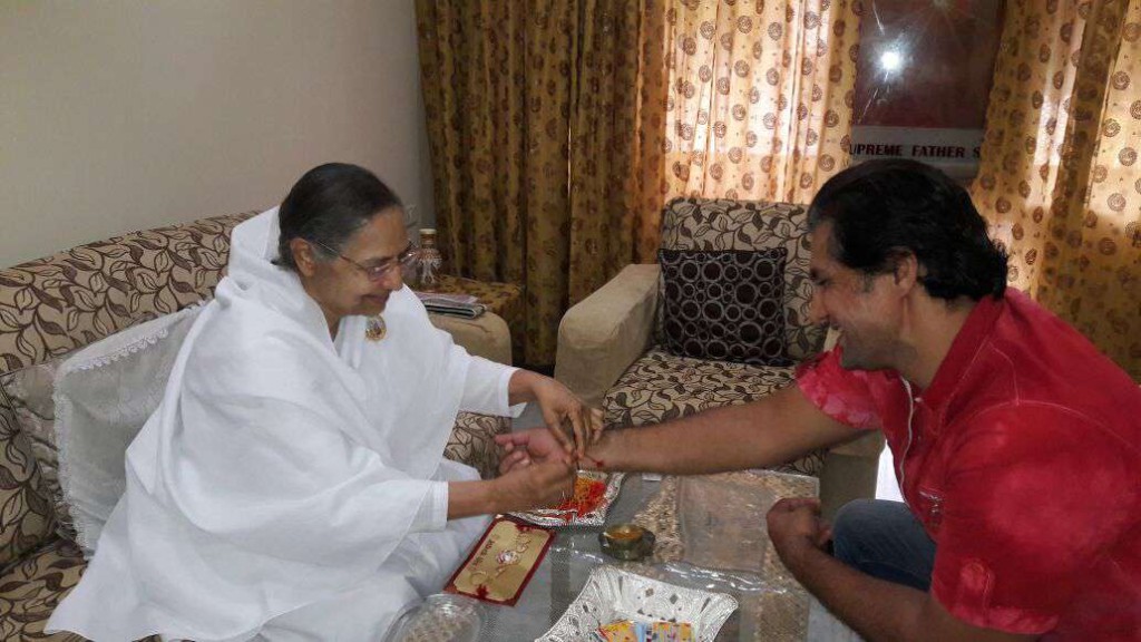 BK Meera tying Rakhi to Actor Mr. Chetan Hansraj